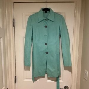 Turquoise jacket made by Karen Kane, size 6.